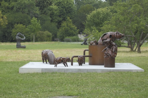 Sculpture Pigs by Dana Meyer 2013, pig figures, steel, brown, modern art, sculpture park, Eschborn,