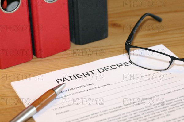 Symbolic image: Healthcare proxy, living will in English on a desk