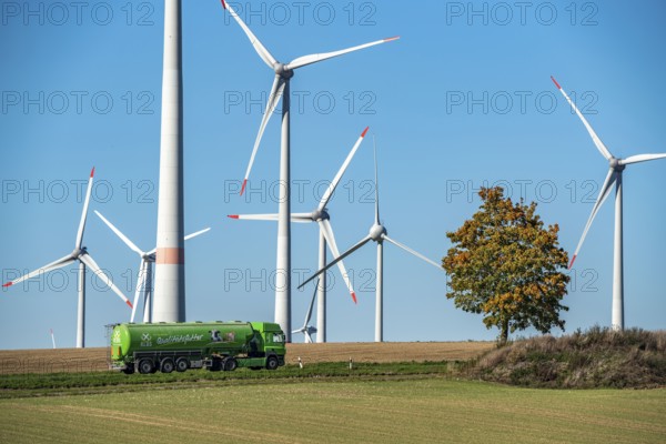 Wind farm near Lichtenau, wind turbines, country road, Driburger Straße, cattle feed transporter,