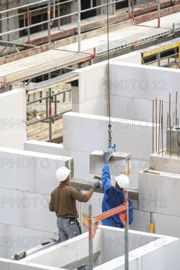 Construction site, new construction of apartment blocks, shell construction, North