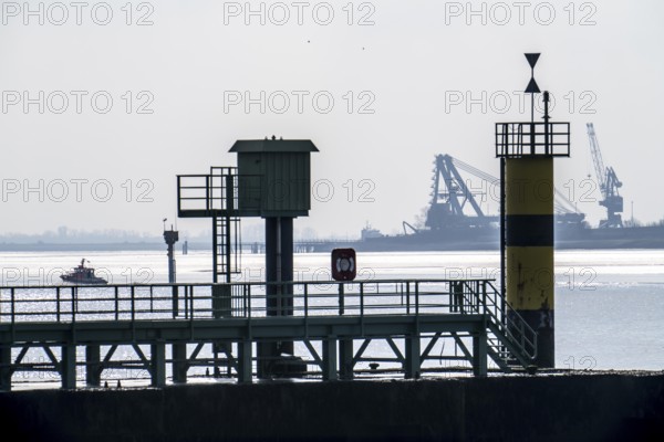 Weser estuary near Bremerhaven, view over the pier of the Freilaufkanal, across the Weser to the