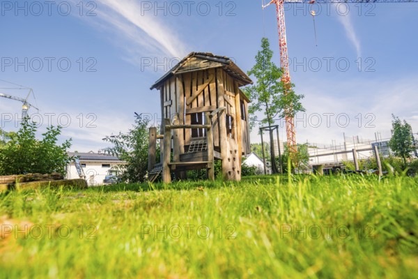 Wooden garden house in a large garden under a blue sky, Nagold, Black Forest, Germany, Europe
