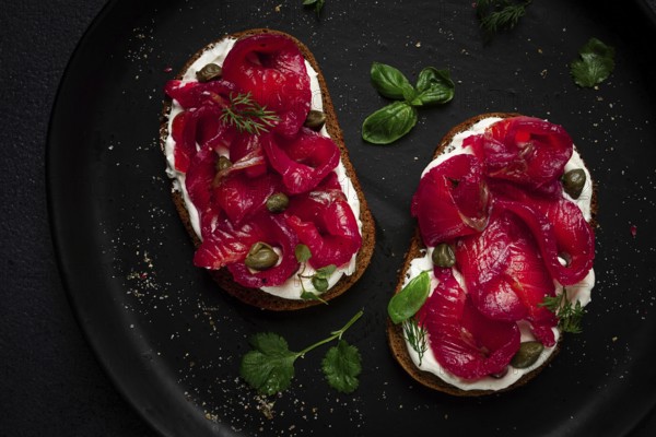 Sandwiches with gravlax salmon, cream cheese, capers, greens, breakfast, homemade