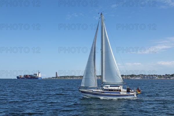 Container ship, sailing boat, naval memorial, Laboe, Schleswig-Holstein, Germany, Europe