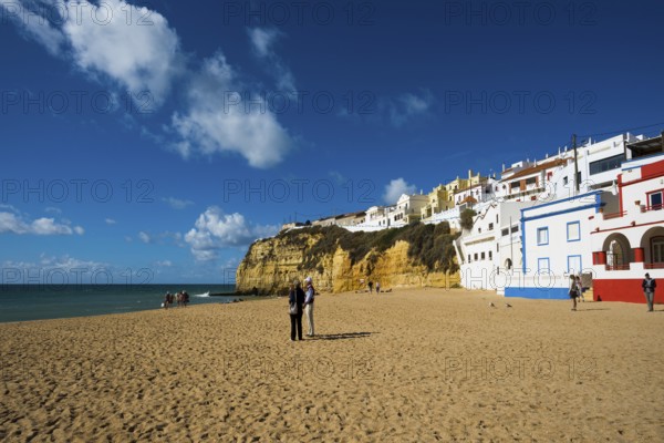 Beach and colourful houses, Carvoeiro, Algarve, Portugal, Europe