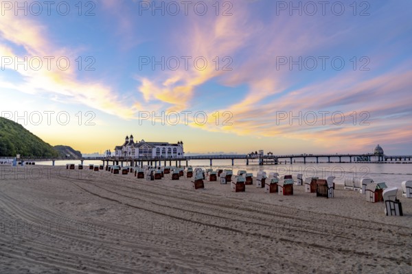 The pier of Sellin, evening mood, sunset, 394 metres long, with restaurant, jetty, beach chairs,