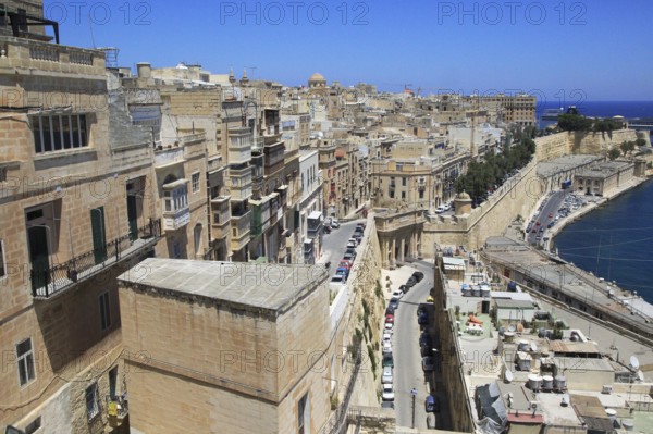 Historic buildings on the Grand Harbour waterfront in Valletta, Malta, Europe