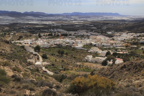 View over village house and plastic farming in the valley from Nijar, Almeria, Spain, Europe