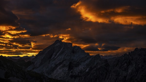 Montafon mountains with dramatic cloudy sky at sunrise, Tschagguns, Rätikon, Montafon, Vorarlberg,