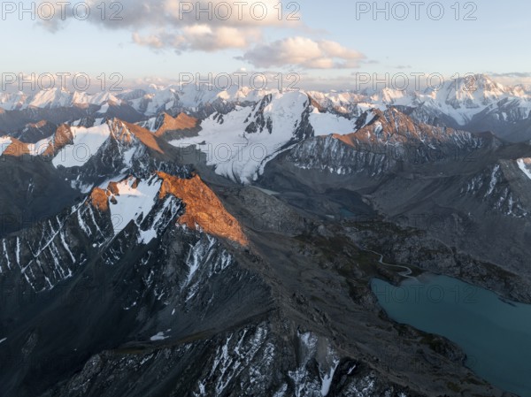 Evening mood, mountain panorama, aerial view, 4000 metre peak with glacier, mountain pass and