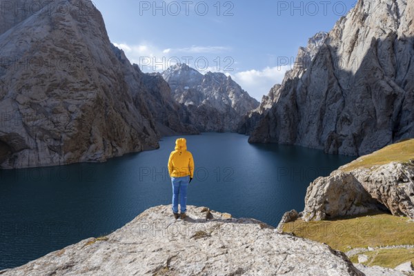 Hiker in front of Kol Suu Mountain Lake, Kol Suu Lake, Sary Beles Mountains, Naryn Province,