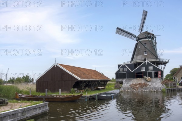 Windmill De Rat on the river Geeuw, wooden sawmill, Ijlst, province of Friesland, Netherlands