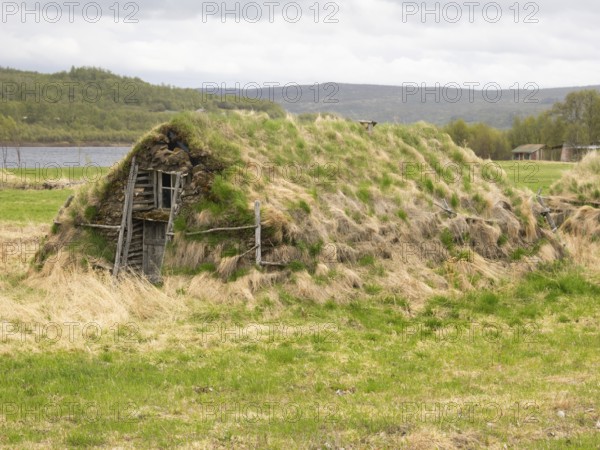 Sami indigenous people's traditional dwellings in open, air museum, May, Finnmark, Norway, Europe