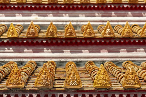 Roof decoration at the Uposatha Hall, Ubosot, the roof is staggered in three tiers and covered with