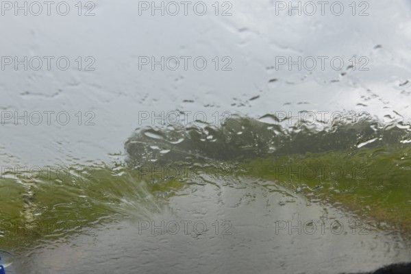 Heavy rain on the Old Post Road near Possendorf in the Eastern Ore Mountains, Possendorf, Saxony,