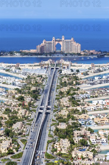 The Palm Jumeirah with Atlantis Hotel artificial island from above in Dubai, United Arab Emirates,