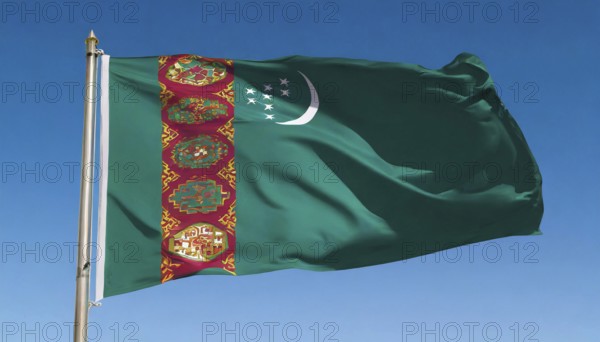 The flag of Turkmenistan flutters in the wind