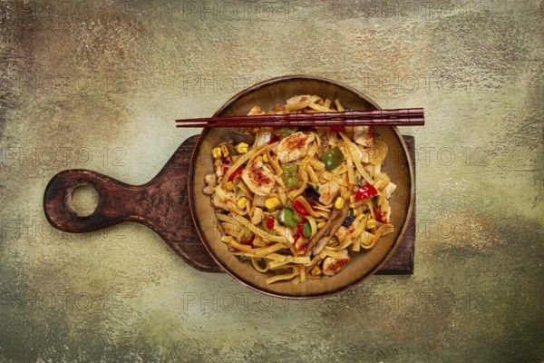 Fried noodles with chicken meat and vegetables, Bami Goreng, Indonesian dish, no people