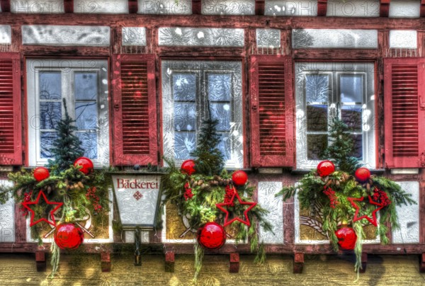 House facade with Christmas decoration, window, window shutters, half-timbered, Christmas motif,