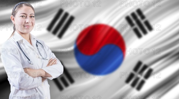 Doctor with crossed arms on South Korean flag. Doctor with stethoscope on South Korean flag.