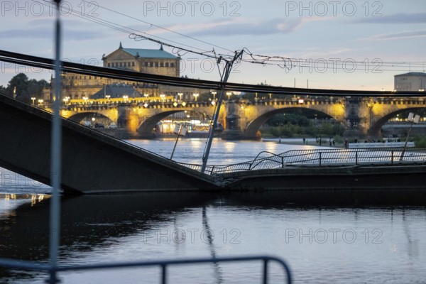 Partial collapse of the Carola Bridge in Dresden with the Semper Opera House in the background,