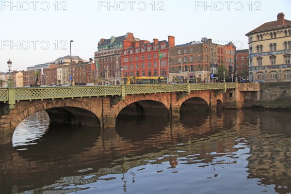 Grattan Bridge crossing River Liffey, Dublin city centre, Ireland, Republic of Ireland, 1870s,
