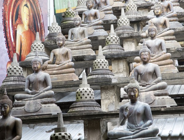 Buddha statues at Gangaramaya Buddhist Temple, Colombo, Sri Lanka, Asia
