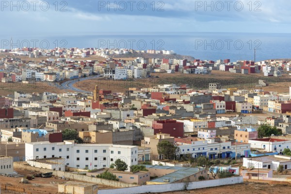 Oblique view over coastal town to Atlantic Ocean, Mirleft, southern Morocco, North Africa
