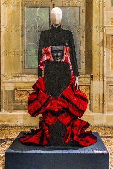 Sculpture in black viscose velvet and folded red taffeta with fibreglass mask, wrapped in silk