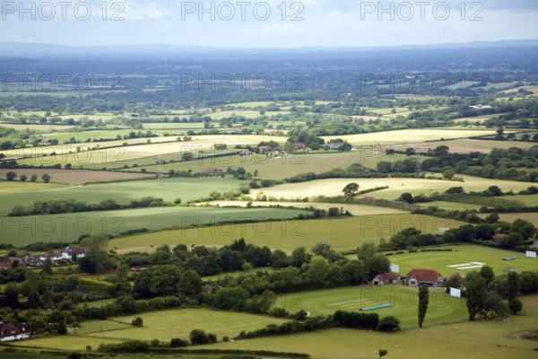 View over patchwork of fields in the Weald near Fulking, West Sussex, England, United Kingdom,