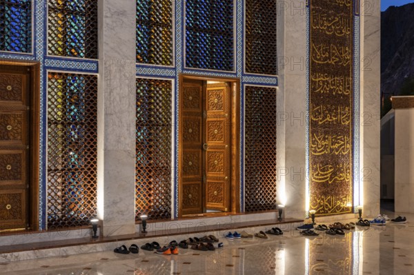 Shoes in front of the entrance of a mosque, Mutrah, Muscat, Oman, Asia
