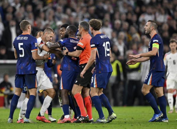 Scuffle around Waldemar Anton GER (03) Denzel Dumfries NED (22) Referee Referee Slavko Vincic (SVN)