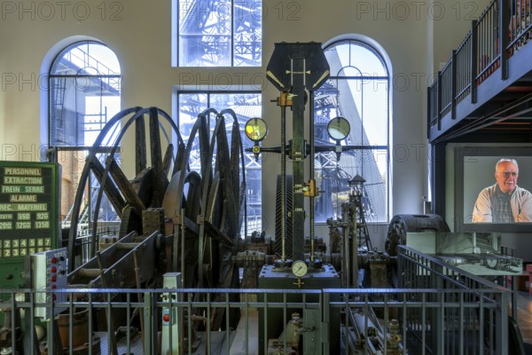 Winding engine with depth indicator to raise and lower lift cage in mine shaft at Le Bois du Cazier