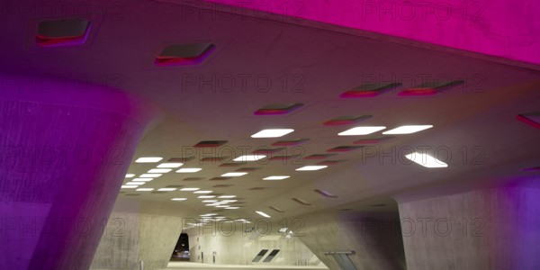 The colourfully illuminated phæno building, an experimental landscape and a science centre in the