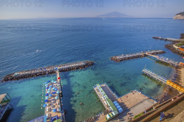 Bathing jetties below the cliffs, Sorrento, Sorrento Peninsula, Gulf of Naples, Campania, Italy,