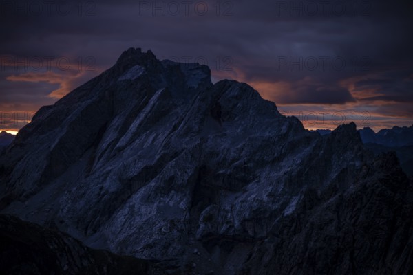 Montafon mountains with dramatic cloudy sky at sunrise, Tschagguns, Rätikon, Montafon, Vorarlberg,