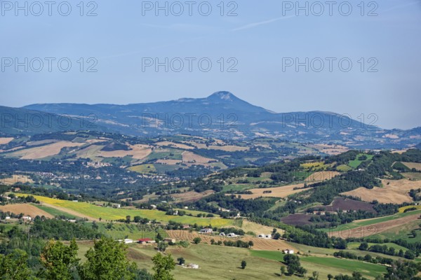 Landscape in the Marche region near San Ginesio and in the background the mountain range of the