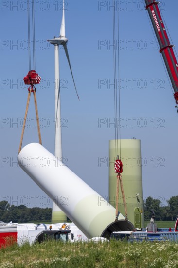Repowering of a wind farm near Issum, here the dismantling of the tower, 9 older wind turbines from