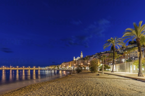 Beach and the old town of Menton by night, Mediterranean Sea, Côte d'Azur, France, Europe