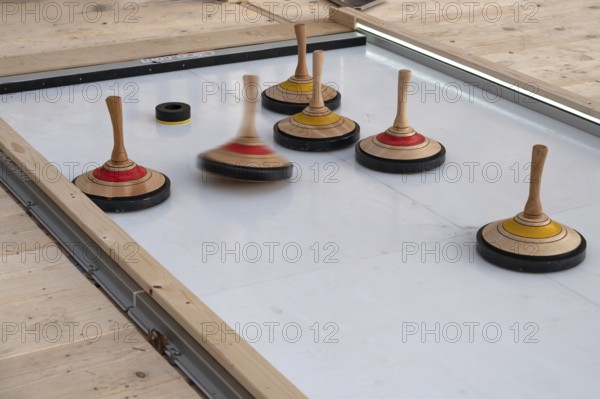 Curling on an artificial ice rink at a Christmas market, Erlangen, Middle Franconia, Bavaria,