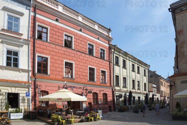 Pink historic building with café and sun terrace in the charming Old Town, Old Town Market Square,