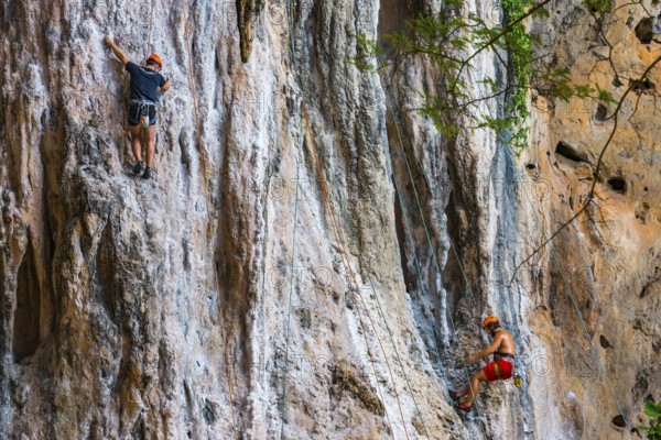 Rock climber at Phra Nang beach near Krabi, climber, outdoor, active holiday, climbing, rocks,