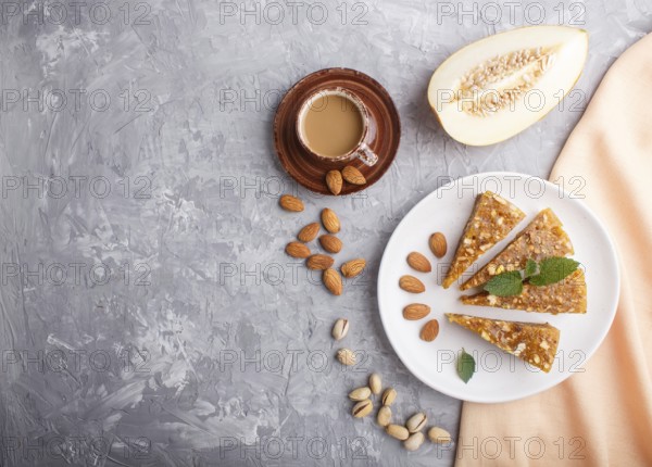 Traditional turkish candy cezerye made from caramelised melon, roasted walnuts, hazelnuts, cashew,