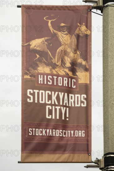 Oklahoma City, Oklahoma, A banner on a light pole in Stockyards City. The area has stores and