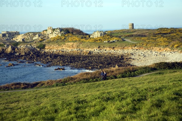 Fort le Marchant headland and loophole 'martello' tower, L'Ancresse bay Guernsey Channel Islands
