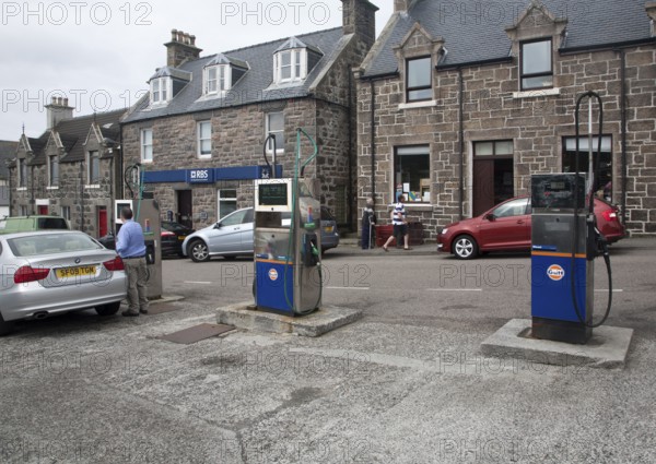 Petrol pumps and shop in the main shopping street in Castlebay the largest settlement in Barra,