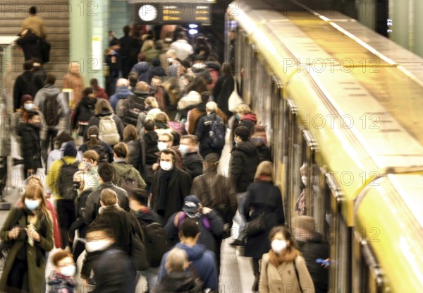 Berlin Alexanderplatz underground station, passengers with masks, 19 October 2020