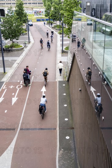 Entrance and exit of the bicycle car park at Utrecht Centraal station, Stationsplein, over 13, 000