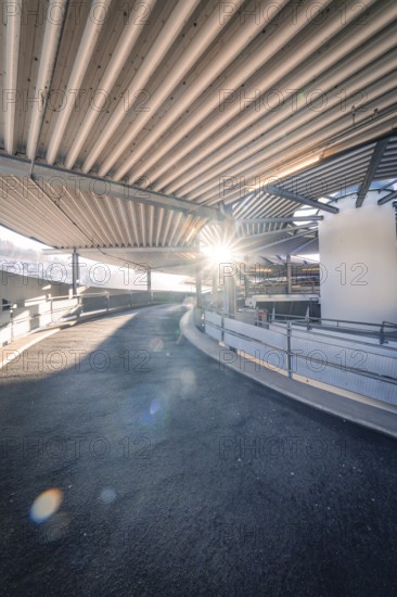 A spiral path in a multi-storey car park with bright sunlight, Kaufland Calw multi-storey car park,
