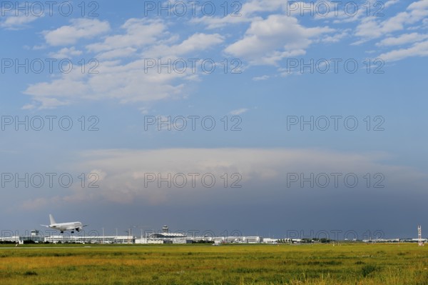 Overview Munich Airport with Runway South with thundercloud, storm cloud, rain cloud, storm, Munich